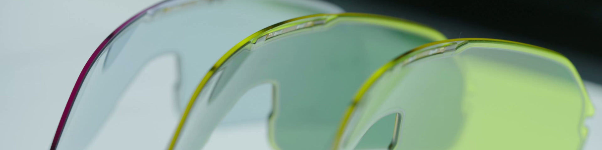 Close-up of a glass container with a clear liquid on a white background